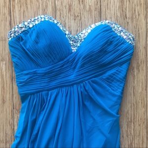 Bright blue long dress with beads and open back